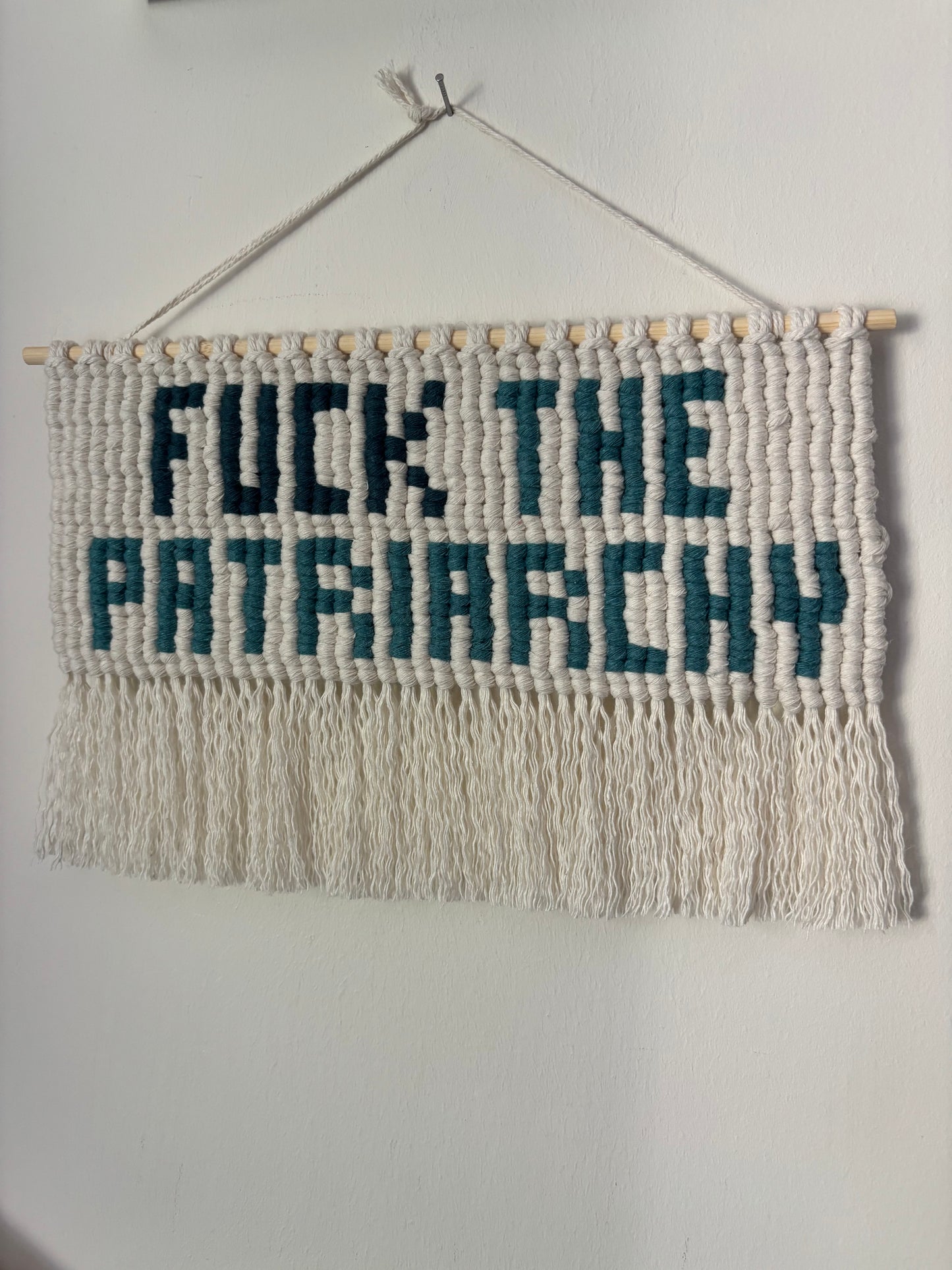 Fuck the Patriarchy wall hanging