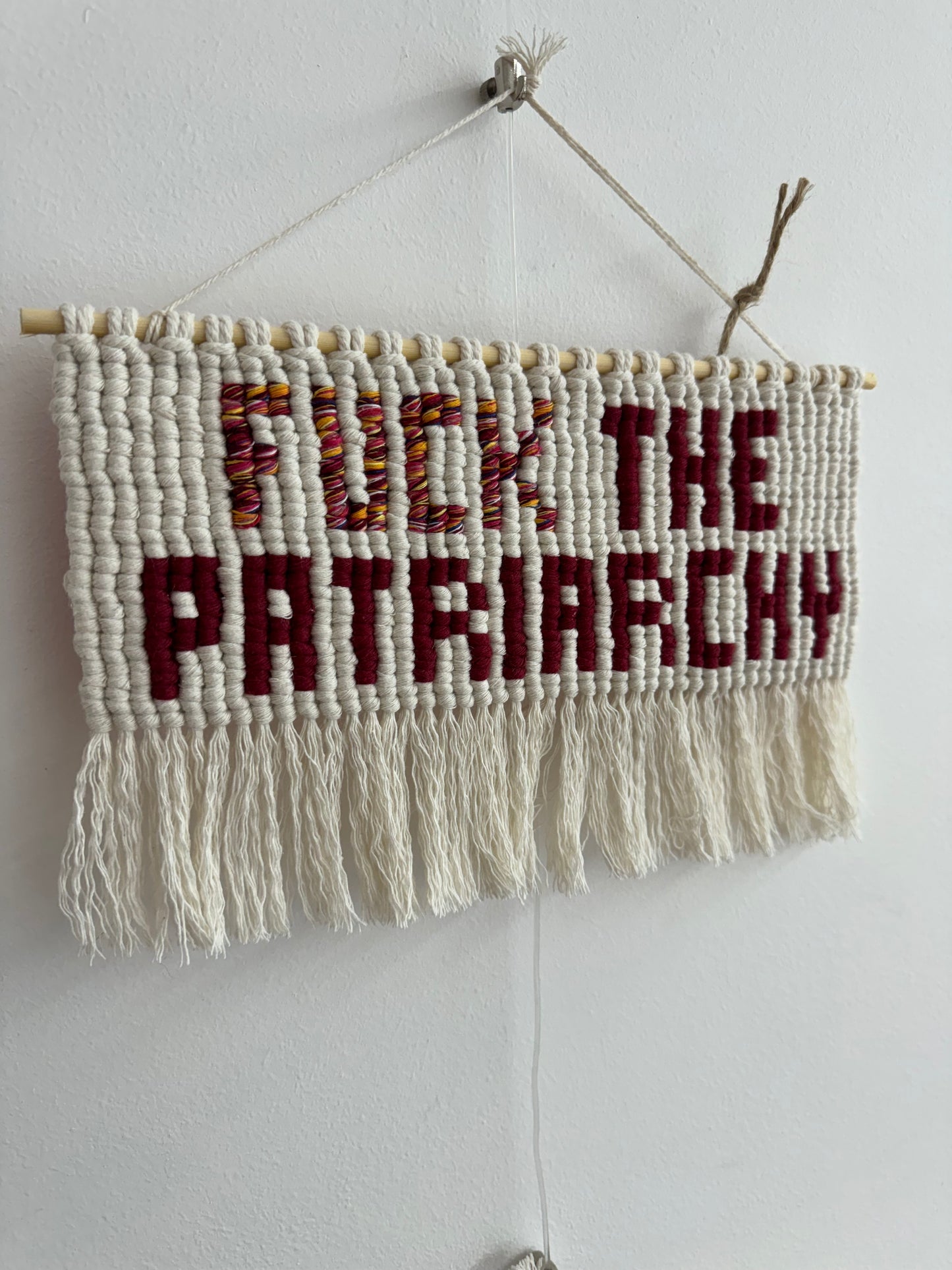 Fuck the Patriarchy wall hanging